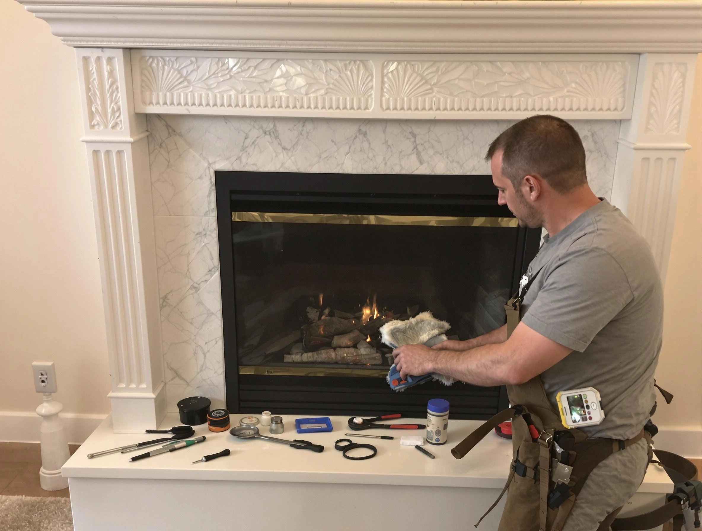 Manchester Chimney Sweep performing fireplace maintenance in Manchester, VA